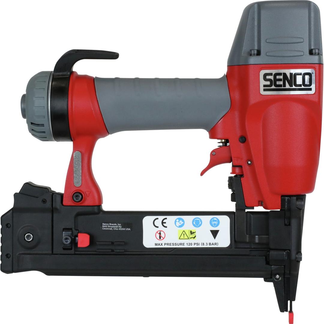 Agrafeuse pneumatique SLS18L MG Magnésium SENCO — Agrafeuse SENCO SLS18L Mg 12-38 mm de profil côté gauche, bandeau de pictogrammes sur le magasin noir